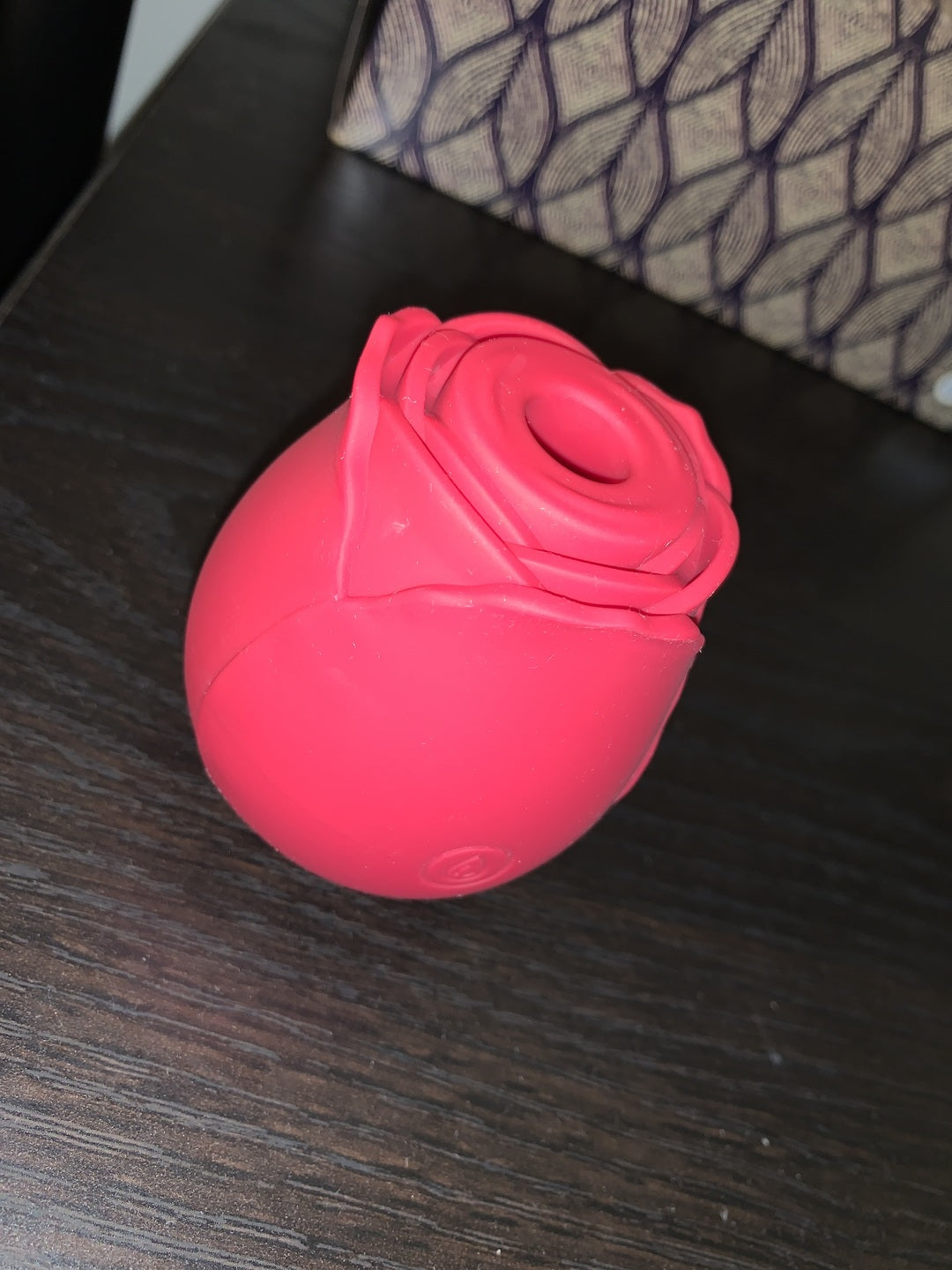 Rose toy close-up showing the suction opening in the center of the petals